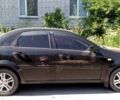 Черный Форд Аспира, объемом двигателя 1.6 л и пробегом 230 тыс. км за 2800 $, фото 1 на Automoto.ua