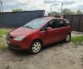 Красный Форд Си-Макс, объемом двигателя 2 л и пробегом 302 тыс. км за 4600 $, фото 1 на Automoto.ua