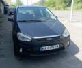 Серый Форд Си-Макс, объемом двигателя 1.8 л и пробегом 244 тыс. км за 5350 $, фото 1 на Automoto.ua