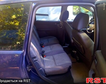 Синий Форд Си-Макс, объемом двигателя 1.8 л и пробегом 209 тыс. км за 3700 $, фото 9 на Automoto.ua