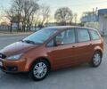 Оранжевый Форд Си-Макс, объемом двигателя 1.8 л и пробегом 300 тыс. км за 3950 $, фото 1 на Automoto.ua