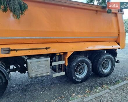 Оранжевый Форд Карго, объемом двигателя 12.9 л и пробегом 210 тыс. км за 70000 $, фото 2 на Automoto.ua
