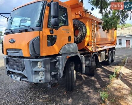 Оранжевый Форд Карго, объемом двигателя 12.9 л и пробегом 210 тыс. км за 70000 $, фото 1 на Automoto.ua