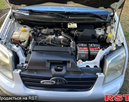 Белый Форд Коннект, объемом двигателя 1.8 л и пробегом 314 тыс. км за 5000 $, фото 12 на Automoto.ua