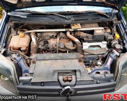 Синий Форд Коннект, объемом двигателя 1.8 л и пробегом 390 тыс. км за 4000 $, фото 13 на Automoto.ua