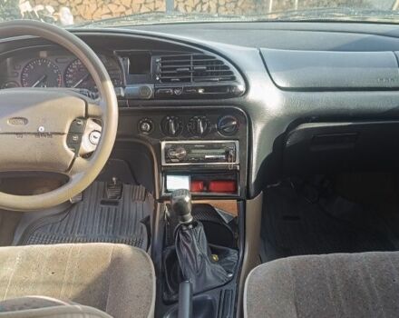 Красный Форд Контур, объемом двигателя 2 л и пробегом 130 тыс. км за 1166 $, фото 6 на Automoto.ua