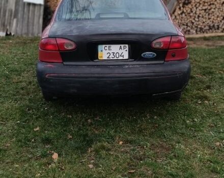 Красный Форд Контур, объемом двигателя 2 л и пробегом 130 тыс. км за 1166 $, фото 2 на Automoto.ua