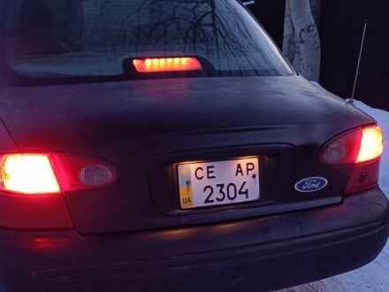 Красный Форд Контур, объемом двигателя 2 л и пробегом 136 тыс. км за 1152 $, фото 1 на Automoto.ua