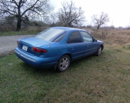 Зеленый Форд Контур, объемом двигателя 2 л и пробегом 240 тыс. км за 1300 $, фото 1 на Automoto.ua