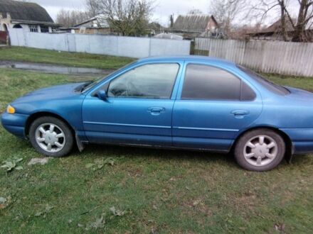 Зеленый Форд Контур, объемом двигателя 2 л и пробегом 240 тыс. км за 1300 $, фото 1 на Automoto.ua