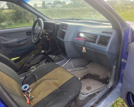 Синій Форд Інша, об'ємом двигуна 2 л та пробігом 222 тис. км за 550 $, фото 6 на Automoto.ua