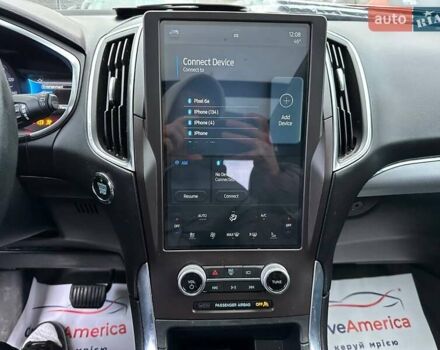 Черный Форд Эдж, объемом двигателя 2 л и пробегом 133 тыс. км за 14900 $, фото 12 на Automoto.ua