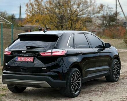 Чорний Форд Едж, об'ємом двигуна 2 л та пробігом 80 тис. км за 19999 $, фото 4 на Automoto.ua