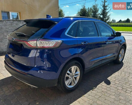 Синий Форд Эдж, объемом двигателя 2 л и пробегом 198 тыс. км за 11000 $, фото 2 на Automoto.ua