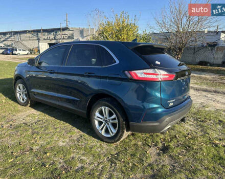 Синий Форд Эдж, объемом двигателя 2 л и пробегом 130 тыс. км за 17700 $, фото 3 на Automoto.ua
