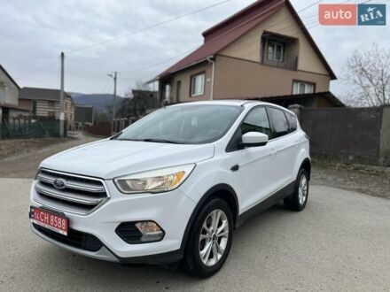 Белый Форд Эскейп, объемом двигателя 2 л и пробегом 209 тыс. км за 11500 $, фото 1 на Automoto.ua