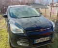 Чорний Форд Ескейп, об'ємом двигуна 2 л та пробігом 124 тис. км за 12500 $, фото 1 на Automoto.ua