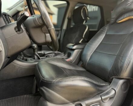 Черный Форд Эскейп, объемом двигателя 2.3 л и пробегом 241 тыс. км за 6250 $, фото 6 на Automoto.ua