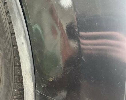 Черный Форд Эскейп, объемом двигателя 2 л и пробегом 201 тыс. км за 10200 $, фото 1 на Automoto.ua