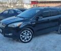 Черный Форд Эскейп, объемом двигателя 2 л и пробегом 205 тыс. км за 11500 $, фото 1 на Automoto.ua