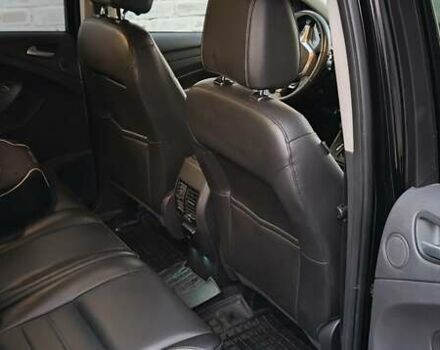 Черный Форд Эскейп, объемом двигателя 2 л и пробегом 140 тыс. км за 14000 $, фото 2 на Automoto.ua