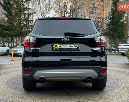 Черный Форд Эскейп, объемом двигателя 2 л и пробегом 151 тыс. км за 16600 $, фото 5 на Automoto.ua