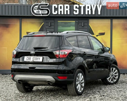 Черный Форд Эскейп, объемом двигателя 1.5 л и пробегом 146 тыс. км за 12700 $, фото 3 на Automoto.ua