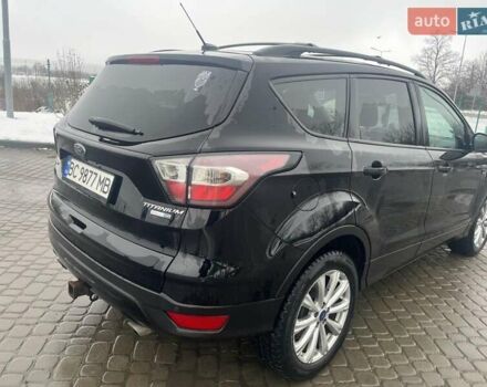 Черный Форд Эскейп, объемом двигателя 2 л и пробегом 111 тыс. км за 15400 $, фото 5 на Automoto.ua