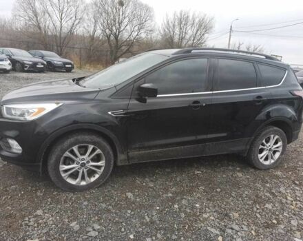 Черный Форд Эскейп, объемом двигателя 2 л и пробегом 147 тыс. км за 12500 $, фото 1 на Automoto.ua