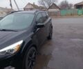 Черный Форд Эскейп, объемом двигателя 2 л и пробегом 75 тыс. км за 12000 $, фото 1 на Automoto.ua