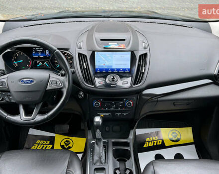 Черный Форд Эскейп, объемом двигателя 2 л и пробегом 151 тыс. км за 16600 $, фото 13 на Automoto.ua