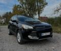 Черный Форд Эскейп, объемом двигателя 2 л и пробегом 135 тыс. км за 9400 $, фото 1 на Automoto.ua