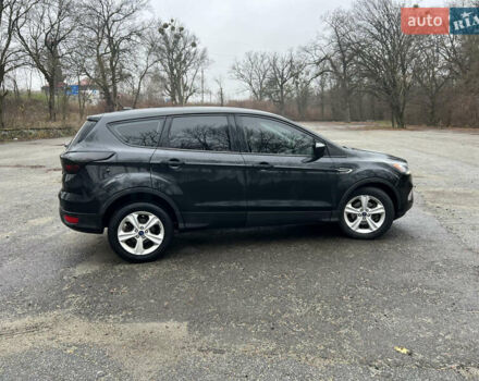 Черный Форд Эскейп, объемом двигателя 2.5 л и пробегом 200 тыс. км за 11700 $, фото 1 на Automoto.ua