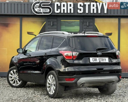 Черный Форд Эскейп, объемом двигателя 1.5 л и пробегом 146 тыс. км за 12700 $, фото 2 на Automoto.ua