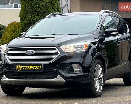 Черный Форд Эскейп, объемом двигателя 2 л и пробегом 151 тыс. км за 16600 $, фото 2 на Automoto.ua