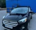 Чорний Форд Ескейп, об'ємом двигуна 1.5 л та пробігом 120 тис. км за 12500 $, фото 1 на Automoto.ua