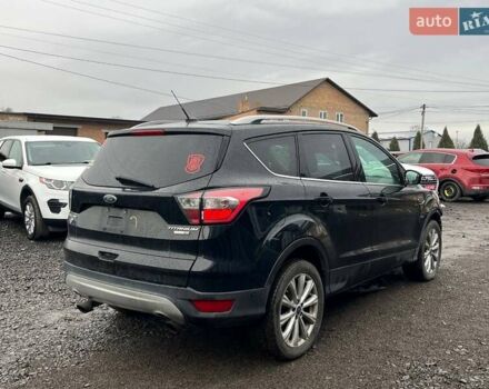 Черный Форд Эскейп, объемом двигателя 2 л и пробегом 194 тыс. км за 9600 $, фото 4 на Automoto.ua