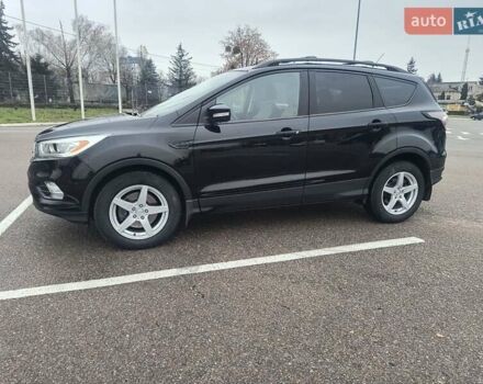 Черный Форд Эскейп, объемом двигателя 2 л и пробегом 232 тыс. км за 10000 $, фото 1 на Automoto.ua