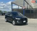 Чорний Форд Ескейп, об'ємом двигуна 2 л та пробігом 126 тис. км за 13200 $, фото 1 на Automoto.ua