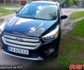 Чорний Форд Ескейп, об'ємом двигуна 1.5 л та пробігом 130 тис. км за 12300 $, фото 1 на Automoto.ua