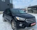 Чорний Форд Ескейп, об'ємом двигуна 1.5 л та пробігом 145 тис. км за 11499 $, фото 1 на Automoto.ua