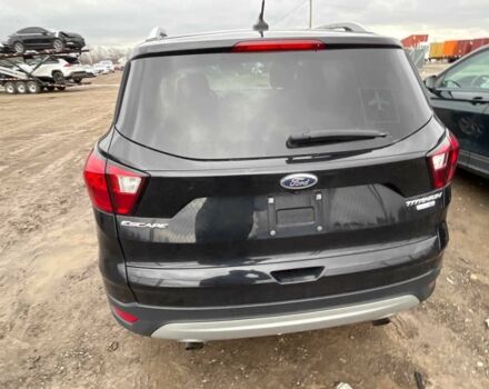 Черный Форд Эскейп, объемом двигателя 2 л и пробегом 115 тыс. км за 9900 $, фото 2 на Automoto.ua