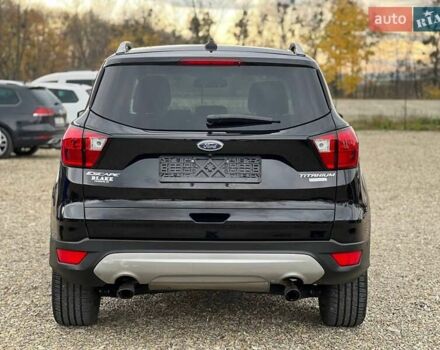 Черный Форд Эскейп, объемом двигателя 2 л и пробегом 137 тыс. км за 14999 $, фото 7 на Automoto.ua