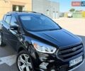 Черный Форд Эскейп, объемом двигателя 2 л и пробегом 123 тыс. км за 12500 $, фото 1 на Automoto.ua