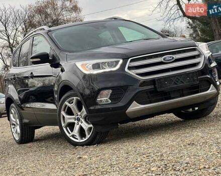 Черный Форд Эскейп, объемом двигателя 2 л и пробегом 137 тыс. км за 14999 $, фото 4 на Automoto.ua