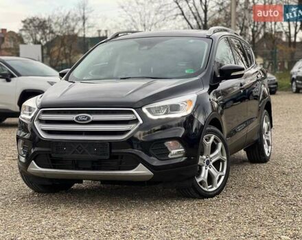 Черный Форд Эскейп, объемом двигателя 2 л и пробегом 137 тыс. км за 14999 $, фото 1 на Automoto.ua