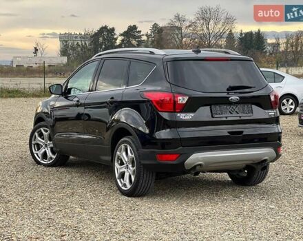 Черный Форд Эскейп, объемом двигателя 2 л и пробегом 137 тыс. км за 14999 $, фото 5 на Automoto.ua