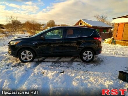 Черный Форд Эскейп, объемом двигателя 2 л и пробегом 260 тыс. км за 11000 $, фото 1 на Automoto.ua