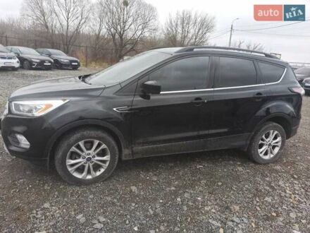 Черный Форд Эскейп, объемом двигателя 2 л и пробегом 147 тыс. км за 12500 $, фото 1 на Automoto.ua