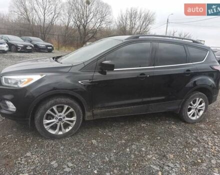 Черный Форд Эскейп, объемом двигателя 2 л и пробегом 147 тыс. км за 12500 $, фото 1 на Automoto.ua